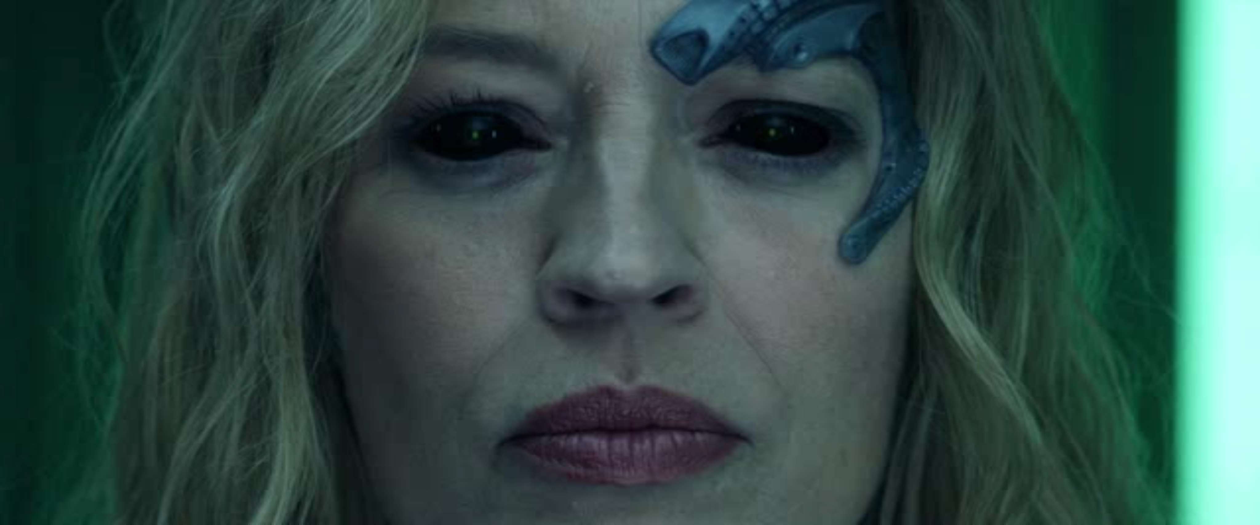 The meme is a screenshot of a character from the TV show "The 100" with a caption that reads "when you're trying to get out of a relationship but your partner is still in it". The image shows a character with a determined expression, but with a "distracted" or "uninterested" look on her face, implying she's not fully invested in the relationship.